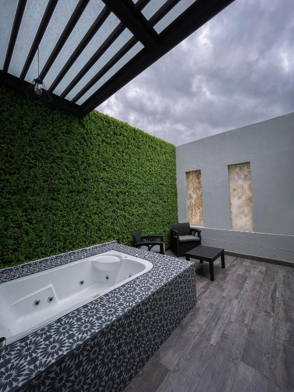 Fato Hotel con bañera de hidromasaje en Querétaro